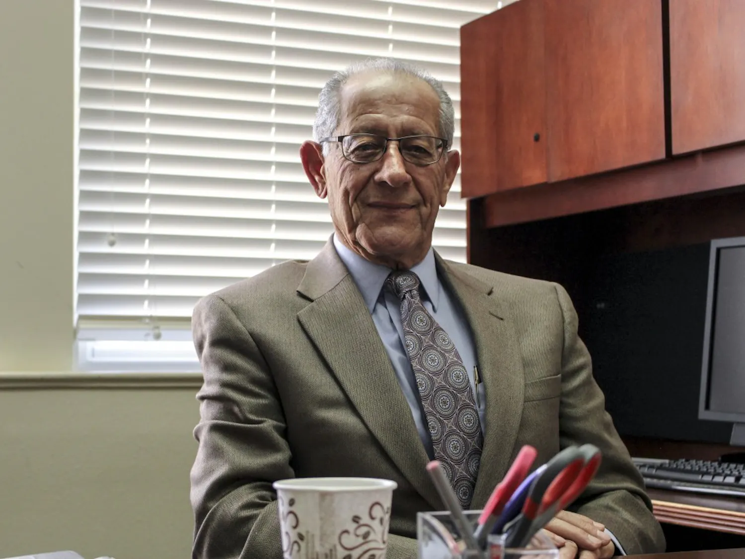 Dr. Emile Nakhleh, director of the Global and National Security Policy Institute, sits in his office on Jan. 27, 2017.