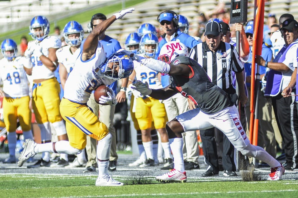 Redshirt senior safety Lee Crosby grabs a San Jose State player on&nbsp;Saturday, Oct. 1, 2016 at University Stadium. The Lobos will face off with Boise State this Friday at 7 p.m.