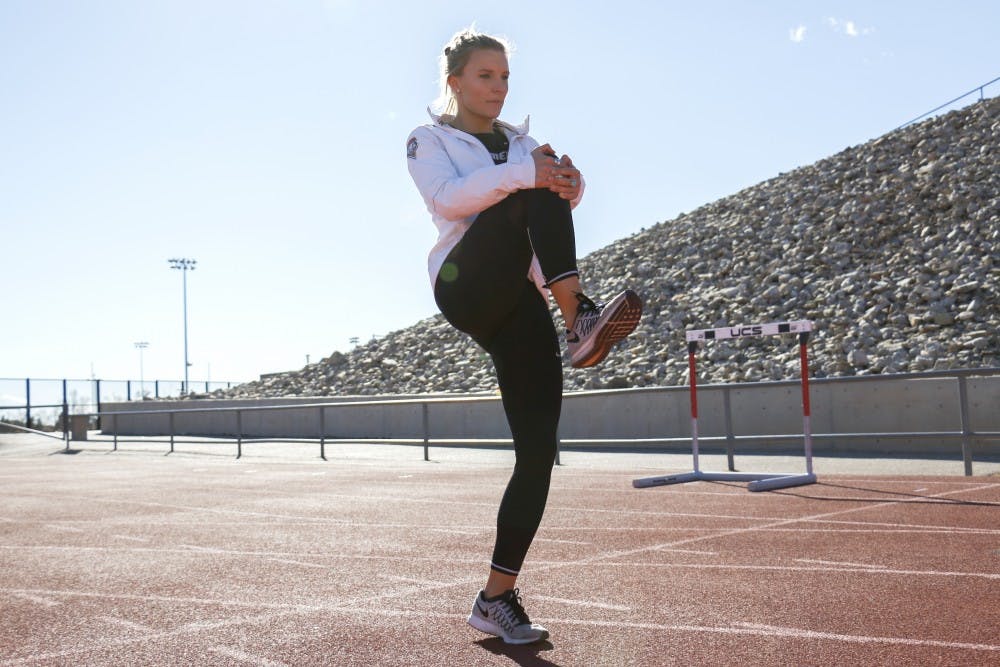 Senior Holly Van Grinsven stretches before her practice on Jan. 20, 2016 at the UNM Soccer Complex. The track team has their first invitational this Friday at the Albuquerque Convention Center. 