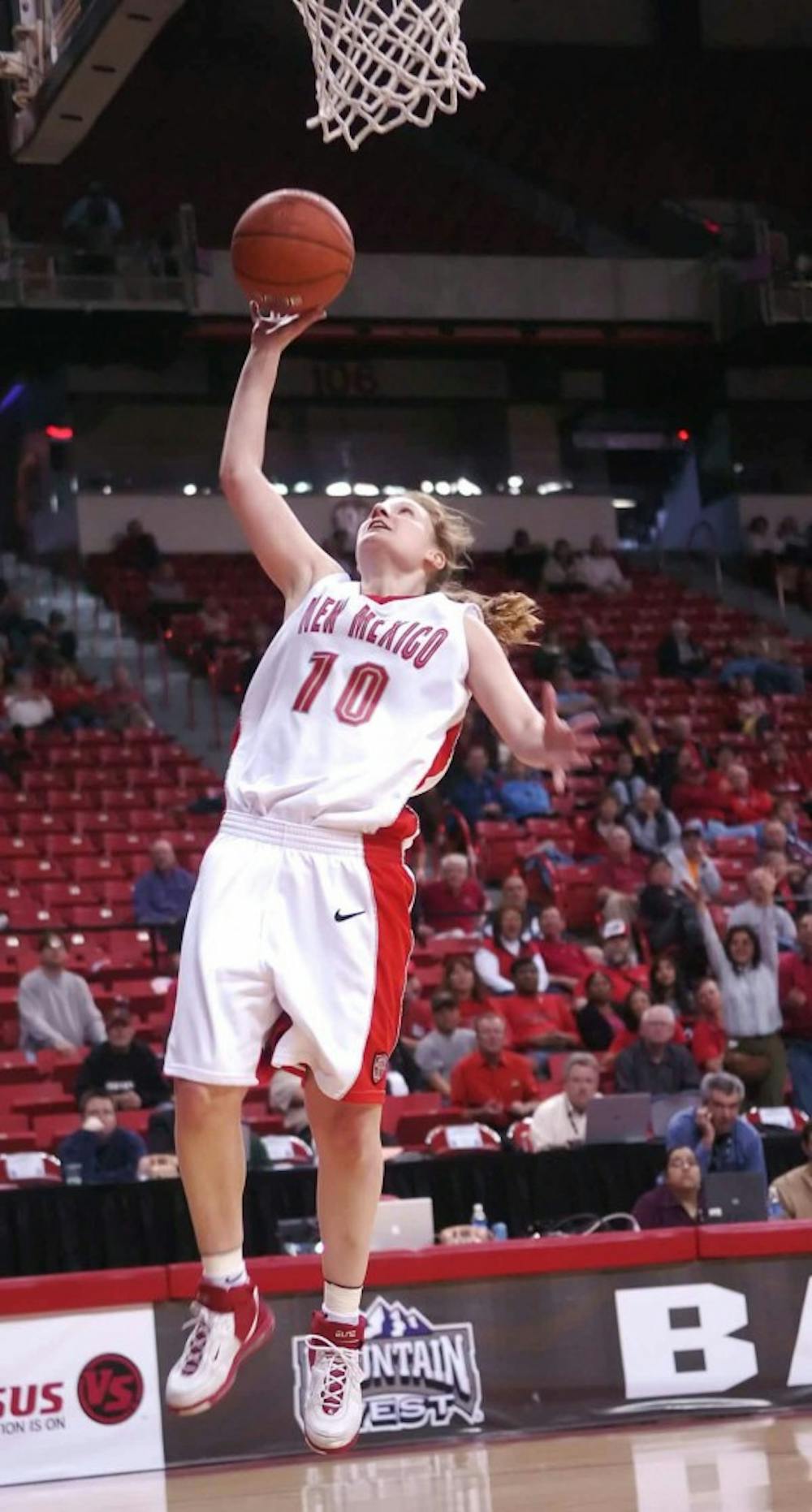 Guard Amy Beggin goes for a layup after a breakaway during Wednesday's game against No. 6-seeded UNLV in the quarterfinal round of the Mountain West Conference Tournament in Las Vegas. The no. 3-seeded Lobos won 80-52 and will face No. 2-seeded Wyoming on