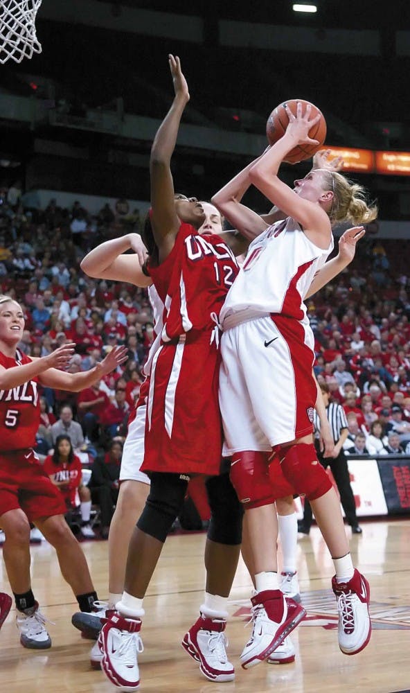 Guard Julie Briody shoots a basket during Wednesday's game against UNLV in the Lobos' 80-52 quarterfinal win in the Mountain West Conference Tournament in Las Vegas. 
