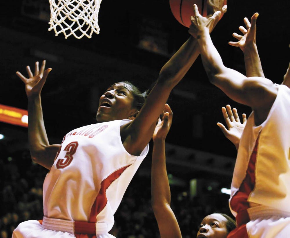 UNM forward Dionne Marsh goes for a layup during the Lobos' 77-41 victory against Sam Houston State on Saturday at The Pit. 