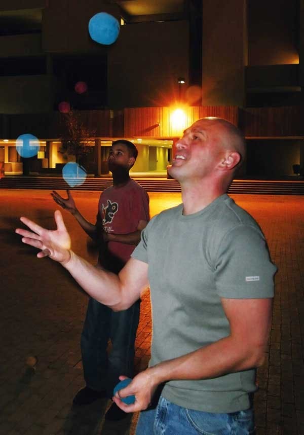 TJ Edwards juggles at Smith Plaza on Friday during a meeting for the UNM Juggling and Unicycling Club.  
