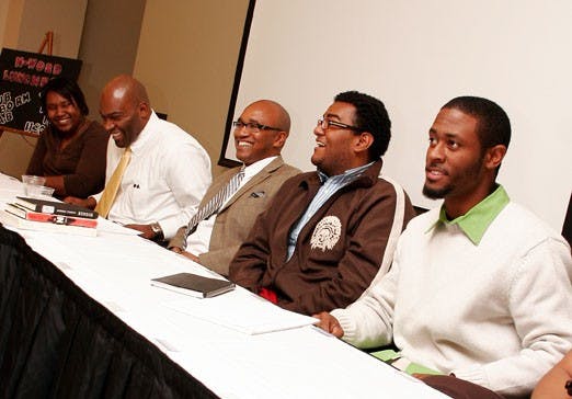 From right, Curis Flakes, Pablo Jose Lopez, Hiram Smith, Stephon Scott and Deidre Gordon laugh at memories of their experiences with the N-word on Tuesday. The group sat on a panel for the Black Student Union's N-word Luncheon in the SUB. 