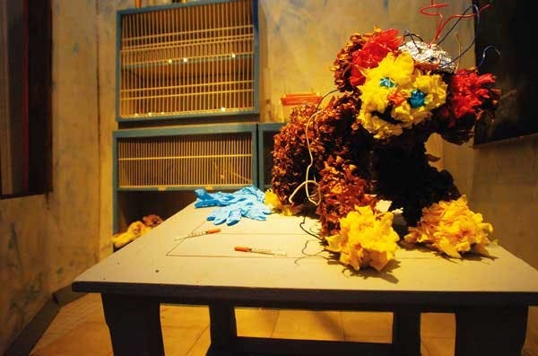 A monkey is operated on in the animal-testing portion of "Quienes Son Los Animales: Altars to Lives Sacrificed for Human Greed" at Working Classroom's Visiones Gallery at 212 Gold Ave. S.W.