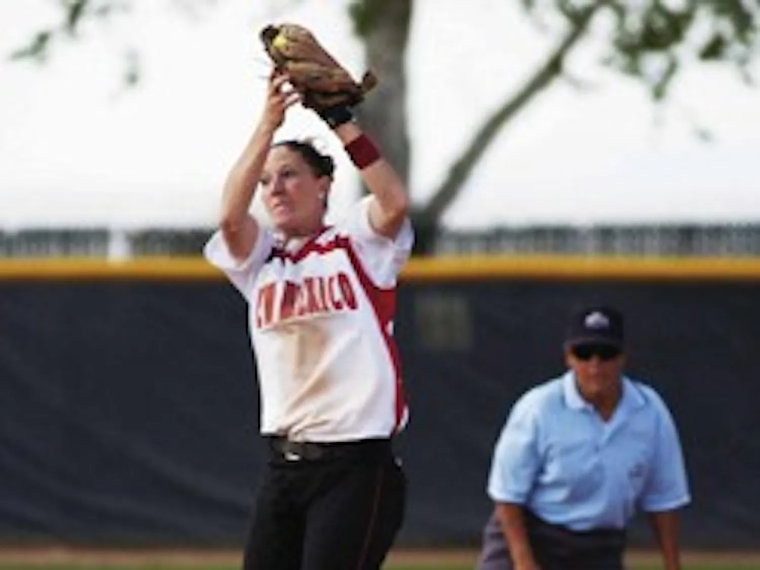UNM second baseman Kristina Schmallen catches a ball that took one hop in the infield during the Lobos' second game of a double-header at Lobo Field.
