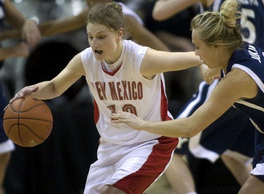 UNM guard Amy Beggin steals the ball from BYU guard Jaime Judkins during the Lobos' win over BYU on Wednesday. The Lobos play Colorado State today in the tournament semifinals.