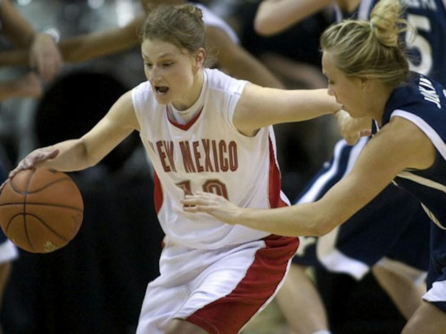 UNM guard Amy Beggin steals the ball from BYU guard Jaime Judkins during the Lobos' win over BYU on Wednesday. The Lobos play Colorado State today in the tournament semifinals.