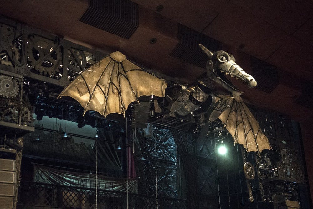 The Clock of the Time Dragon overlooks the “Wicked” audience.