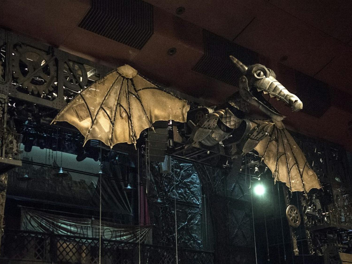 The Clock of the Time Dragon overlooks the “Wicked” audience.