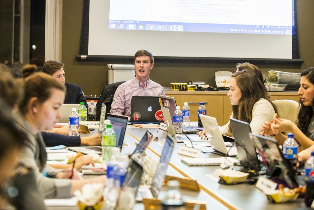 Senators sit around a table at an ASUNM meeting on Jan. 1, 2016 at the UNM SUB. Among the business for the Senate’s next meeting on Wednesday evening is discussing the possibility of diaper-changing stations in all on-campus restrooms.
