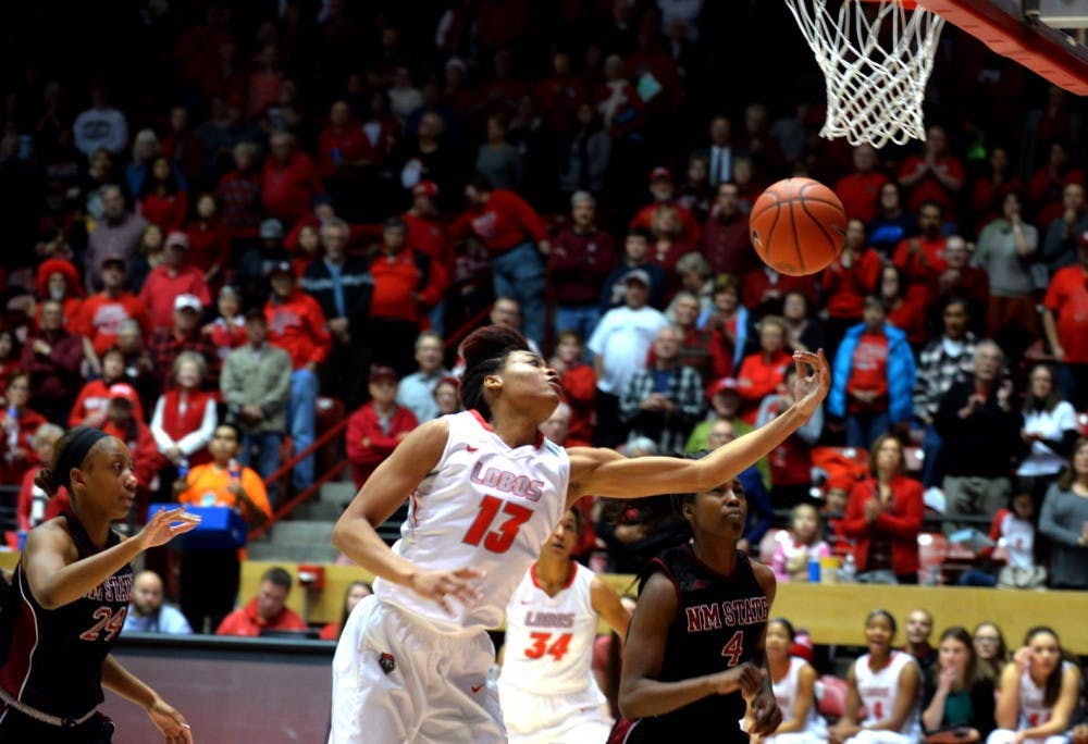 Senior forward Khadijah Shumpert tips the ball in the air at WisePies Arena Dec. 20. The Lobos will play Nevada this Wednesday in Reno. 