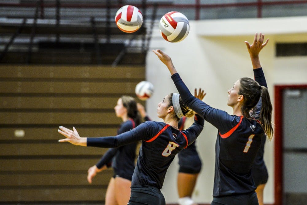 The Lobo volleyball team practices at Johnson Center for their media day Monday August 15, 2016. The Lobos will play their first exhibition match this Saturday.