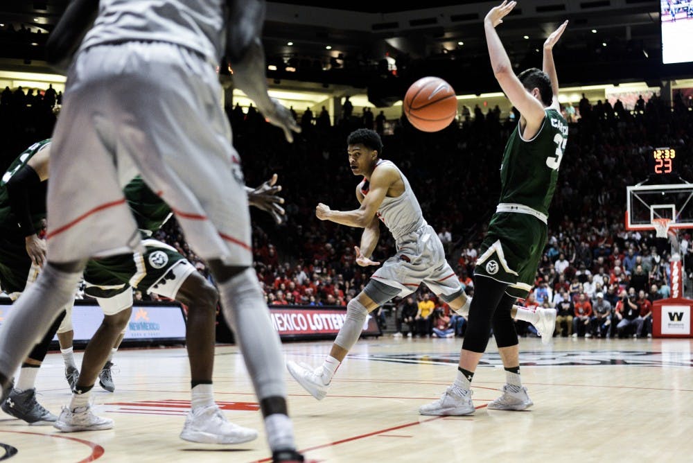 Freshman Jalen Harris launches a pass in between Colorado State players during their game Tuesday, Feb. 21, 2017 at WisePies Arena. Harris along with a handful of Lobos such as Sam Logwood will be leaving the UNM athletic program after their 2016-2017 season.&nbsp;