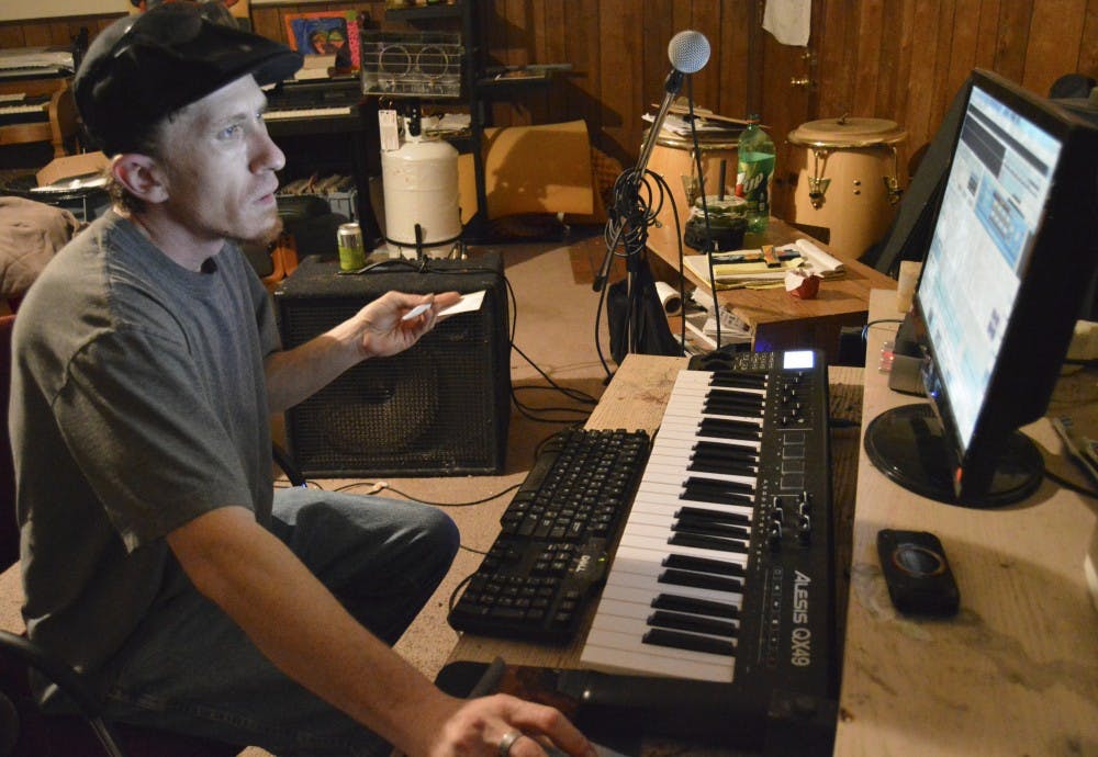 James Breslin works on making music at his house on March 12. Breslin is a local DJ who performs at various music events.  