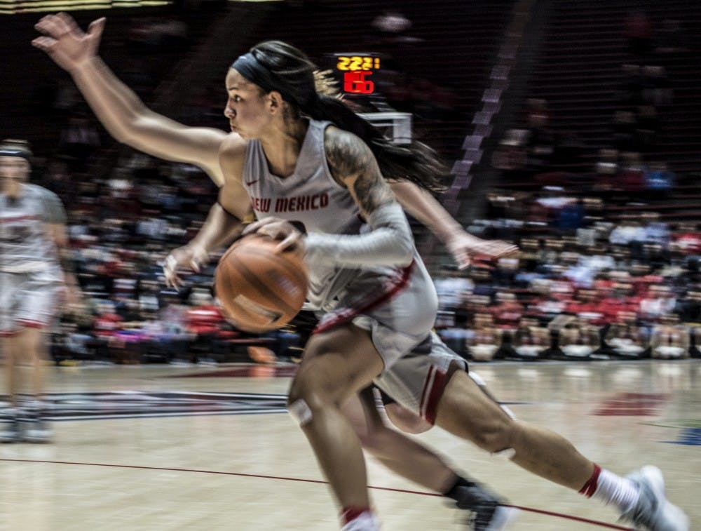 Cherise Beynon drives to the rim during the first quarter against the University of Wyoming at Dreamstyle Arena on Wednesday night. Wyoming outpaced the Lobos and secured a narrow one-point victory, 63-62.