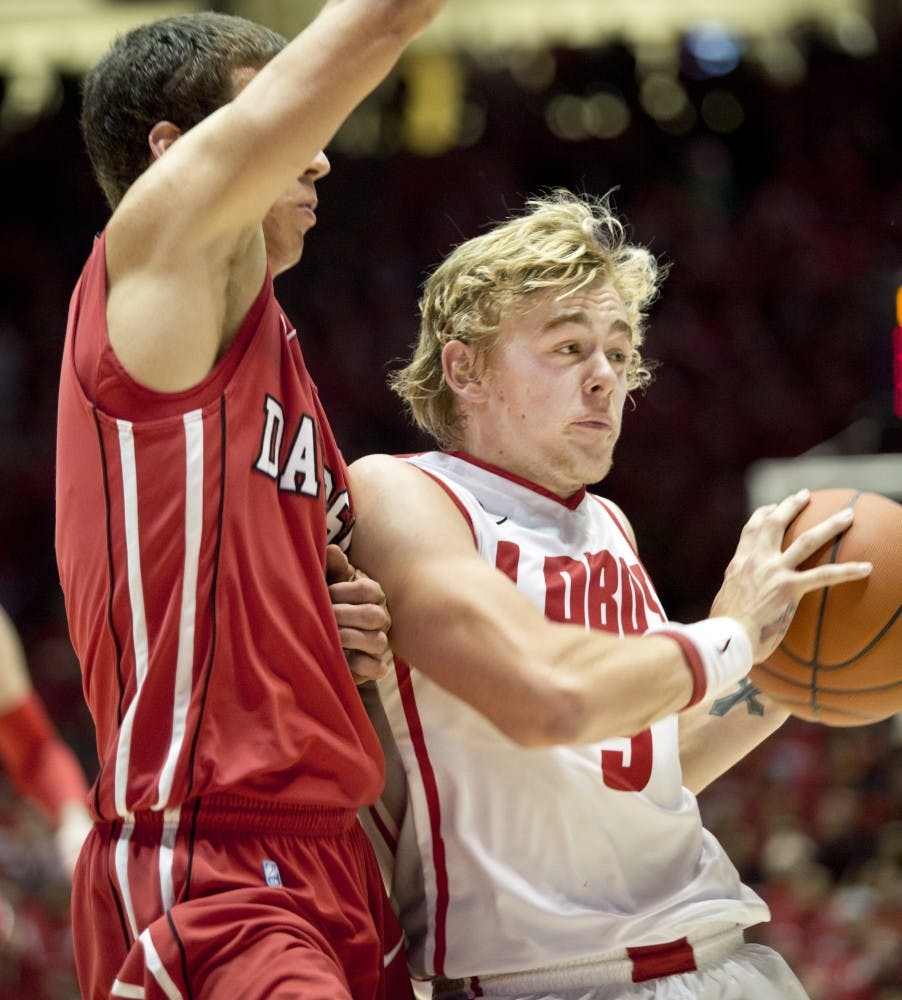 	Sophomore guard Hugh Greenwood attempts a pass against Davidson on Nov. 12. The Lobos won the Paradise Jam on Monday by defeating Connecticut 66-60 in the championship game.