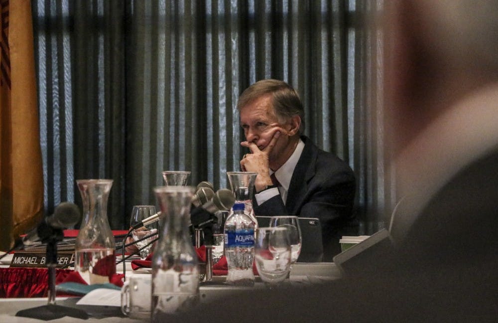 Regent Michael Brasher listens during the Board of Regents meeting on Nov. 15, 2018.