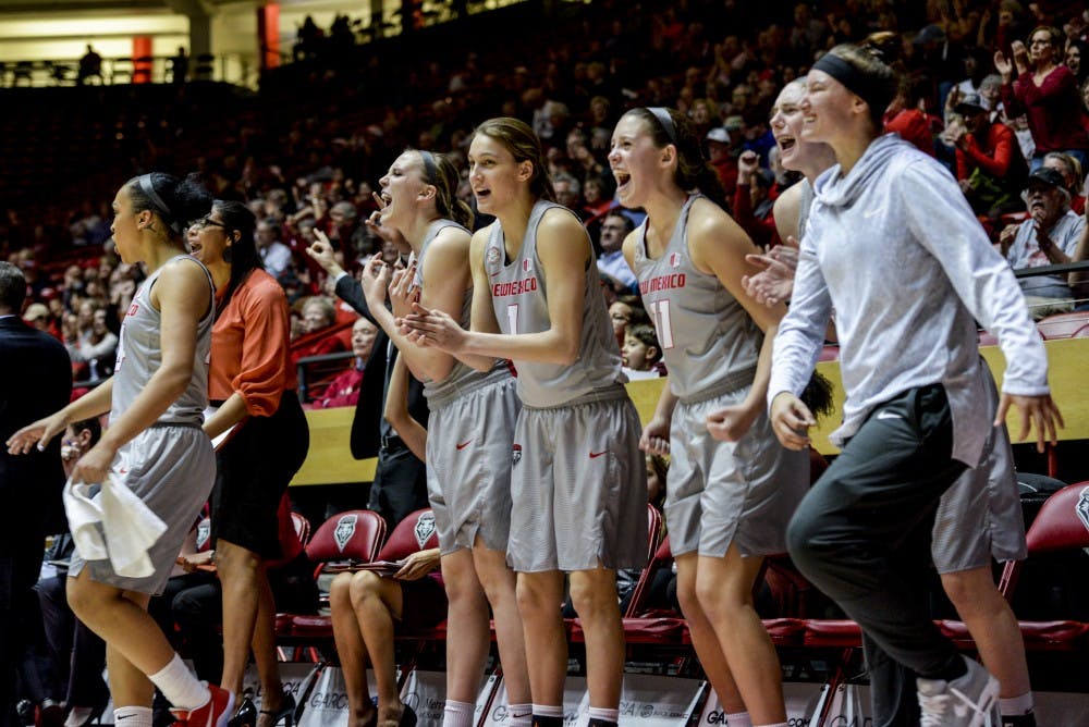The Lobo bench stands and celebrates during their game against Utah State Wednesday, Jan. 4, 2016 at WisePies Arena. The Lobos defeated Nevada University 69-63 for their fourth consecutive conference victory.&nbsp;
