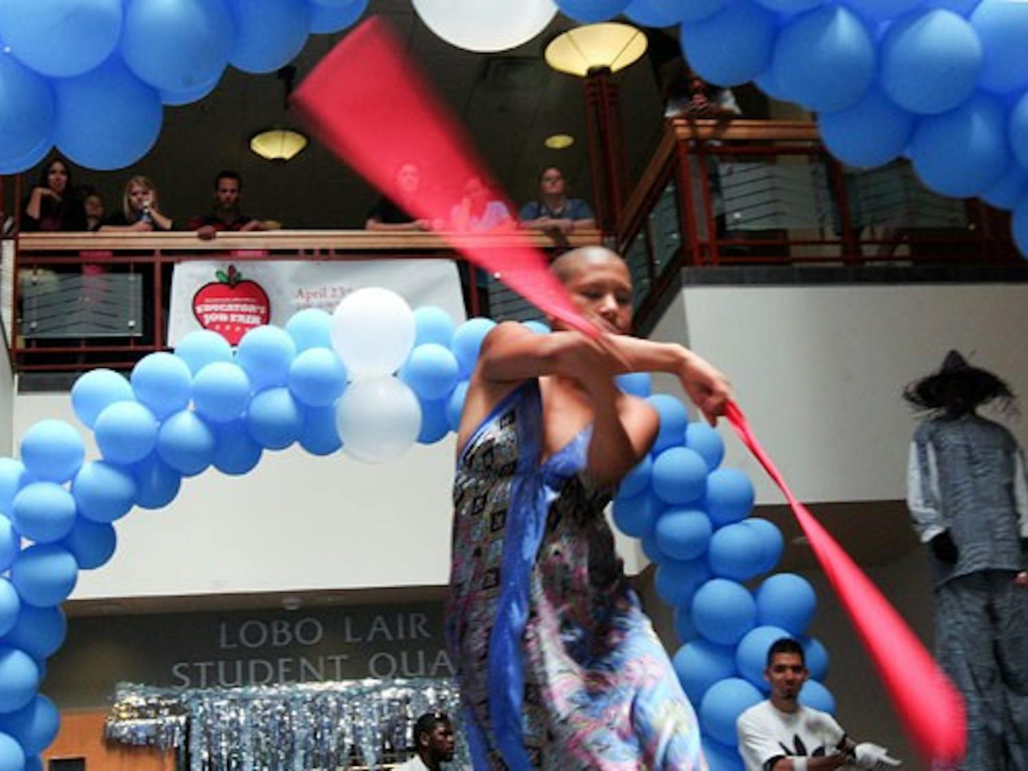 Odessa Winter spins poi during the "Fire and Ice" fashion show Monday in the SUB. The show was put on by Black Men in Motion.