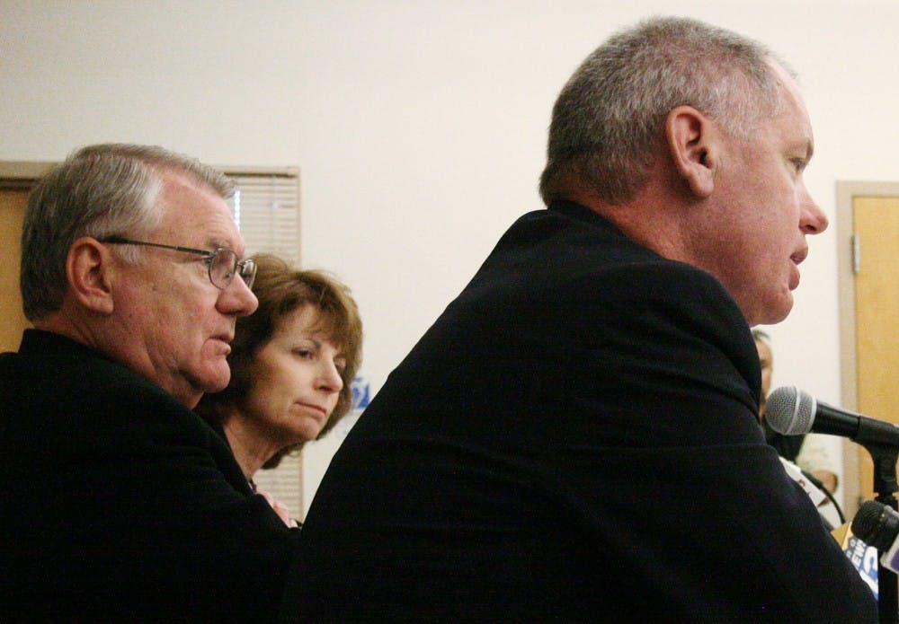 	Athletics Director Paul Krebs, right, answers a reporter’s question during a press conference in the SUB on Wednesday. Krebs, Vice President for Human Resources Helen Gonzales and UNM President David Schmidly sought to clarify the incident involving a physical altercation between head football coach Mike Locksley and assistant coach J.B. Gerald. “We’re embarrassed by the whole situation,” Schmidly said in his opening remarks. 