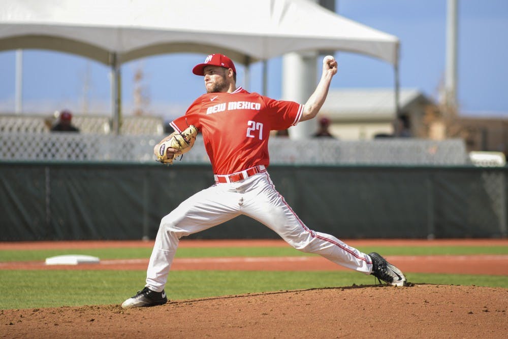 Junior Luis Gonzalez arches back as he pitches to a Binghamton player on Sunday, Feb. 19, 2017 at Santa Ana Star Field. The Lobos managed a conference play-opening sweep of Air Force this weekend, outscoring the Falcons 59-28 over three games.&nbsp;