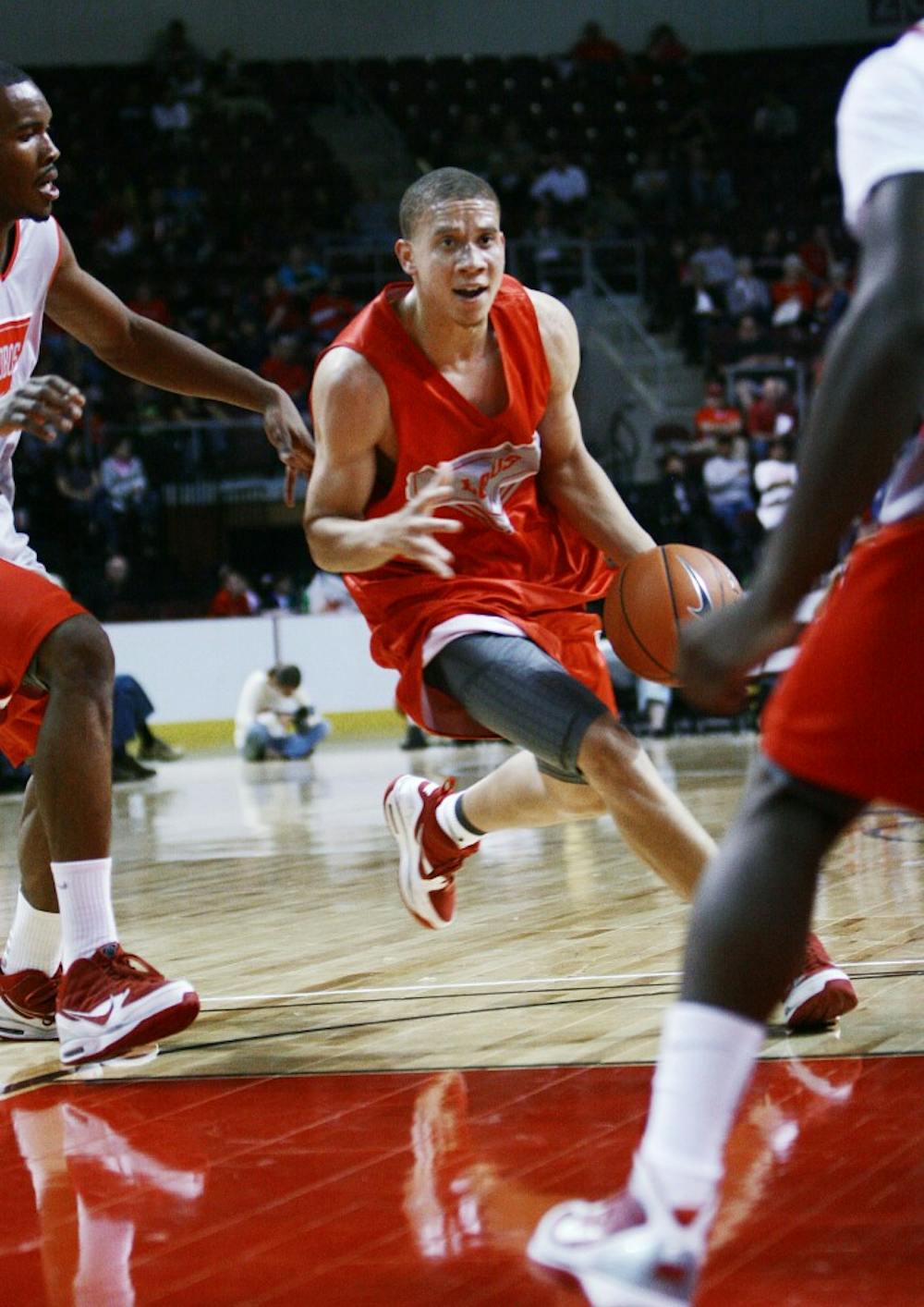 	Phillip McDonald slashes through the lane in this file photo. McDonald will have to have to be more assertive with the basketball this season in order to temper UNM losing three seniors