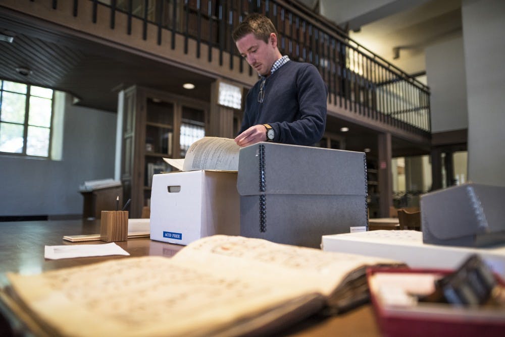 Southwest Research and Special Collection’s Michael Taylor sorts through some of the archives that that will be featured in “Archives Unexpected!” on Wed, April 26, 2017 in Zimmerman Library.