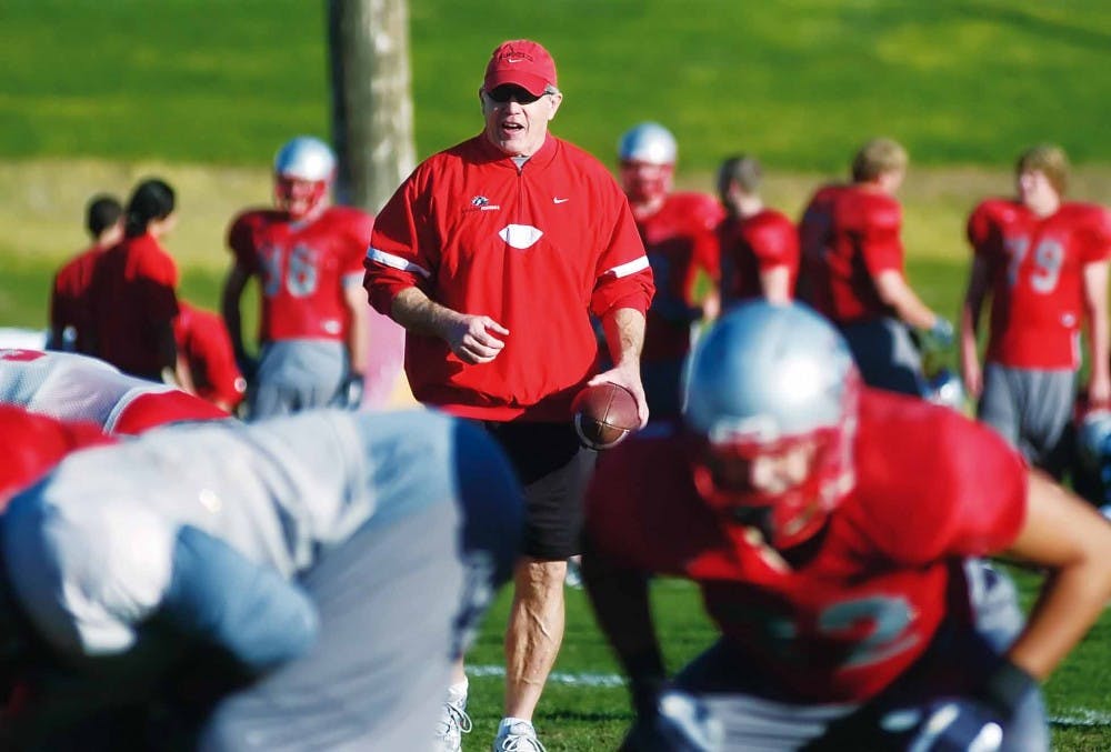 Head coach Rocky Long calls plays during special teams practice on Thursday. 