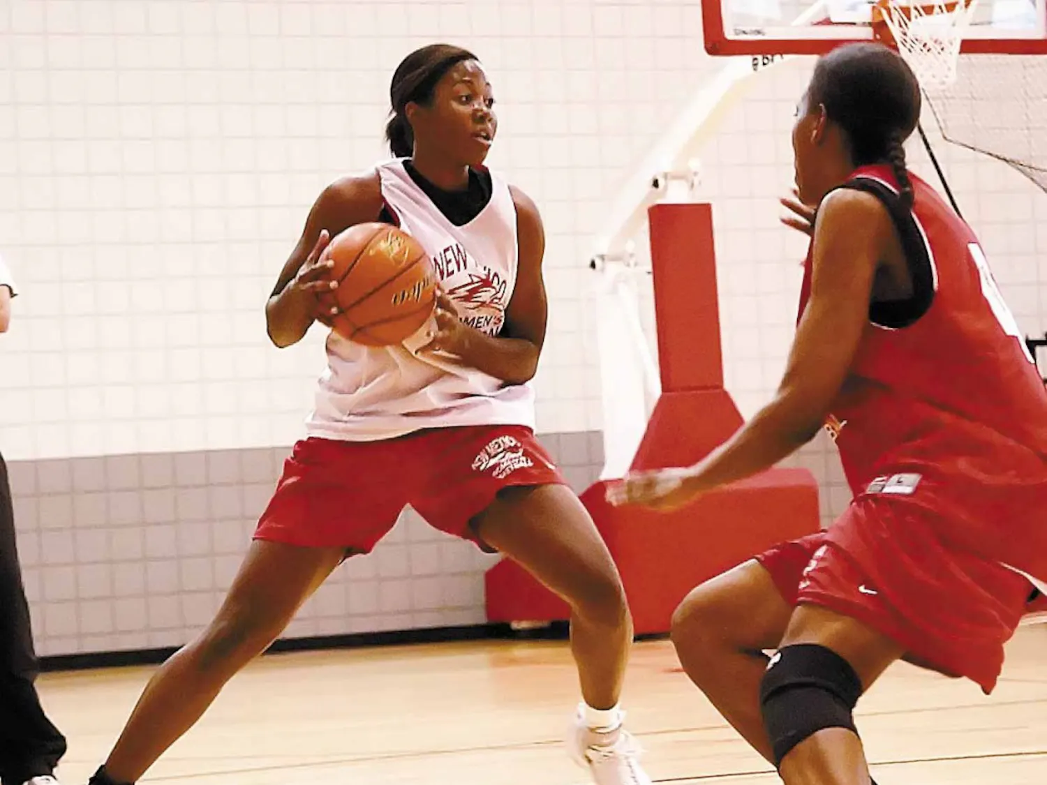 Lobo guard Brandi Kimble, right, defends forward Christian Shelter during a practice at the Rudy Davalos Basketball Center on Wednesday.