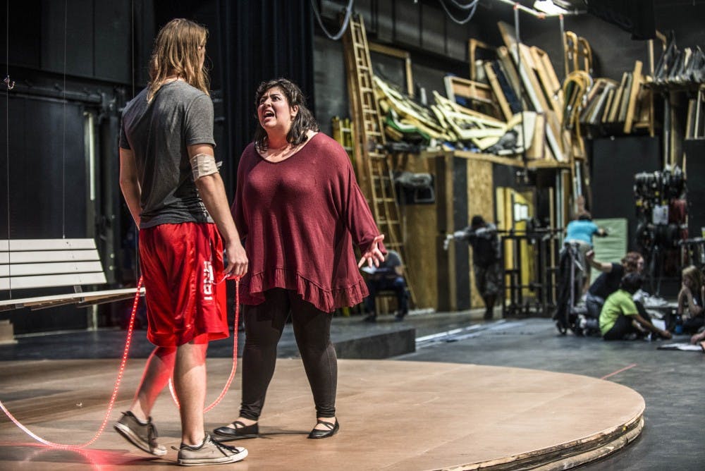 Monica Villalba, right, and Orion Smith rehearse their roles for the upcoming SCRAP production presentation of A Bench at the Edge. The UNM student theatre organization will debut the show September 22nd, which will run until October 1, 2017.