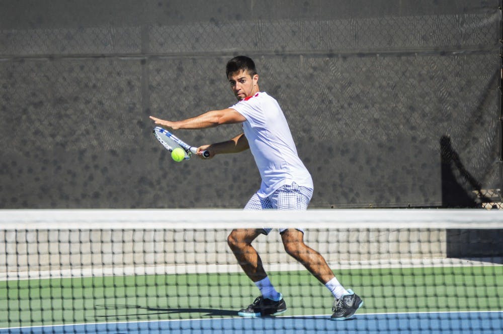 Redshirt senior Rodolfo Jauregui prepares to return the ball during the Balloon Fiesta Invitational Saturday, Nov. 8, 2016 at the McKinnon Family Tennis Stadium. The Lobos lost to Cal Poly 4-3 this past weekend.&nbsp;