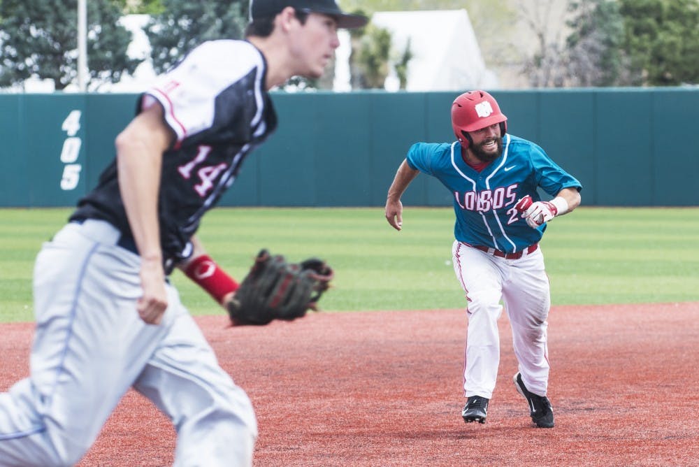 Senior infielder Jared Holley attempts to steal third base Sunday afternoon at Santa Ana Star Field. The Lobos swept Fresno State this weekend, winning all three of their games.