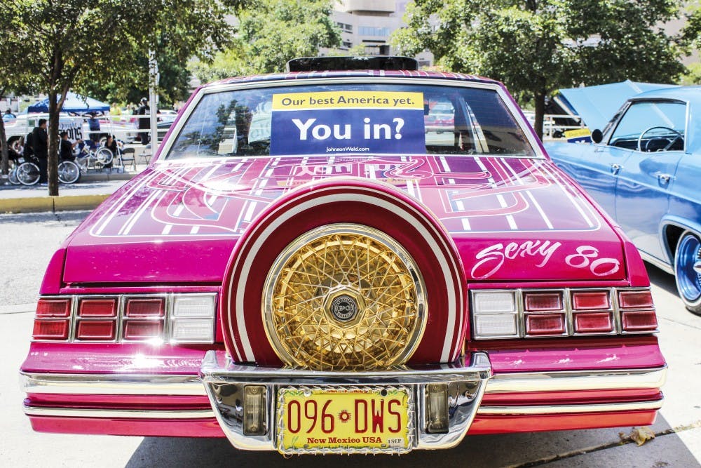 A low rider sits in front of the Albuquerque Convention Center in support of Libertarian presidential candidate Gary Johnson’s rally on Saturday, Aug. 20, 2016.