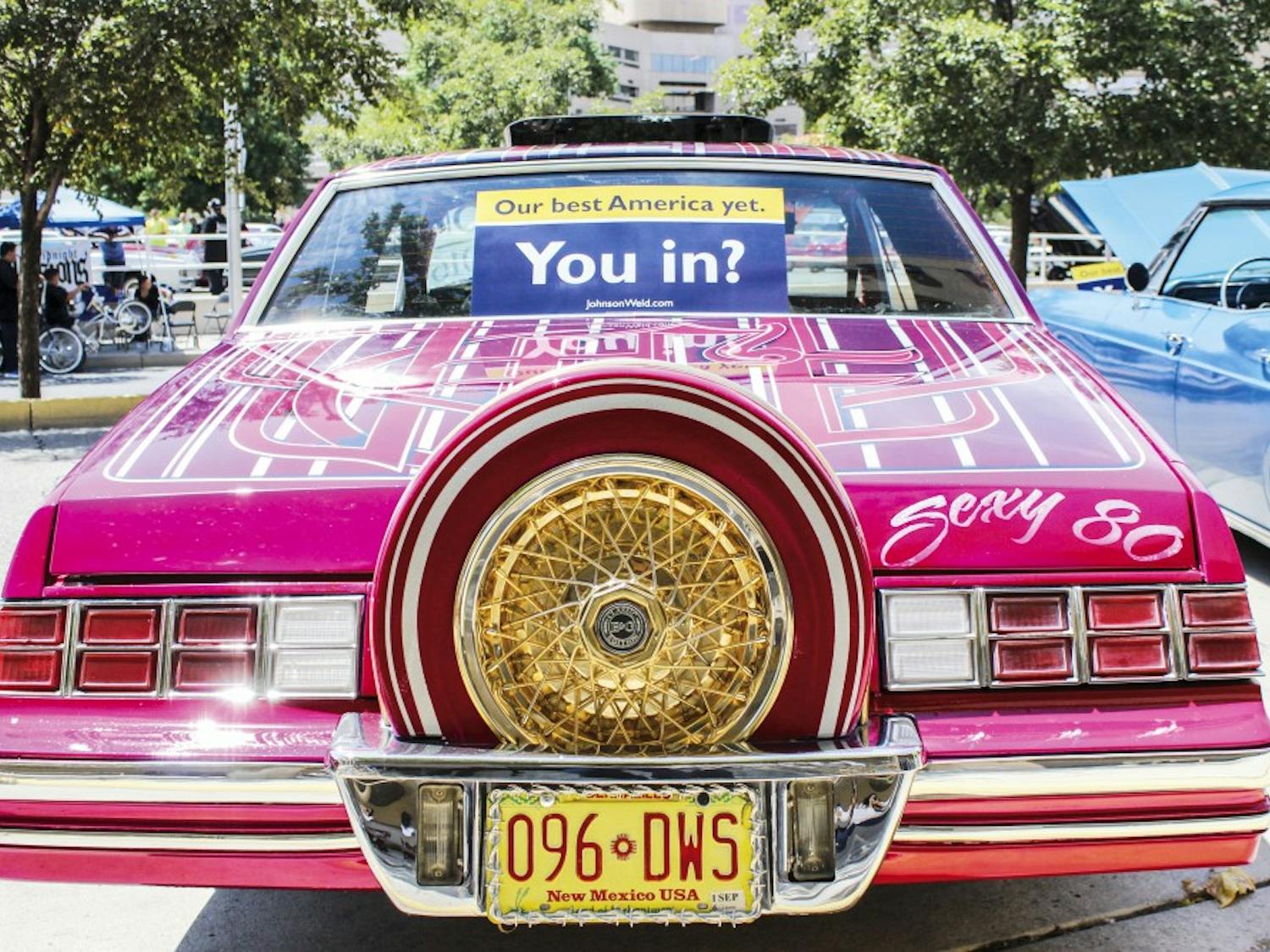 A low rider sits in front of the Albuquerque Convention Center in support of Libertarian presidential candidate Gary Johnson’s rally on Saturday, Aug. 20, 2016.