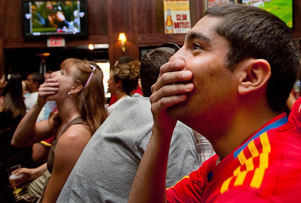 	Guillermo Trujillo anxiously watches the 2010 FIFA World Cup final between Spain and the Netherlands at Fox and Hound Pub and Grille on July 11. The Spaniards were victorious over the Dutch in extra time, 1-0.