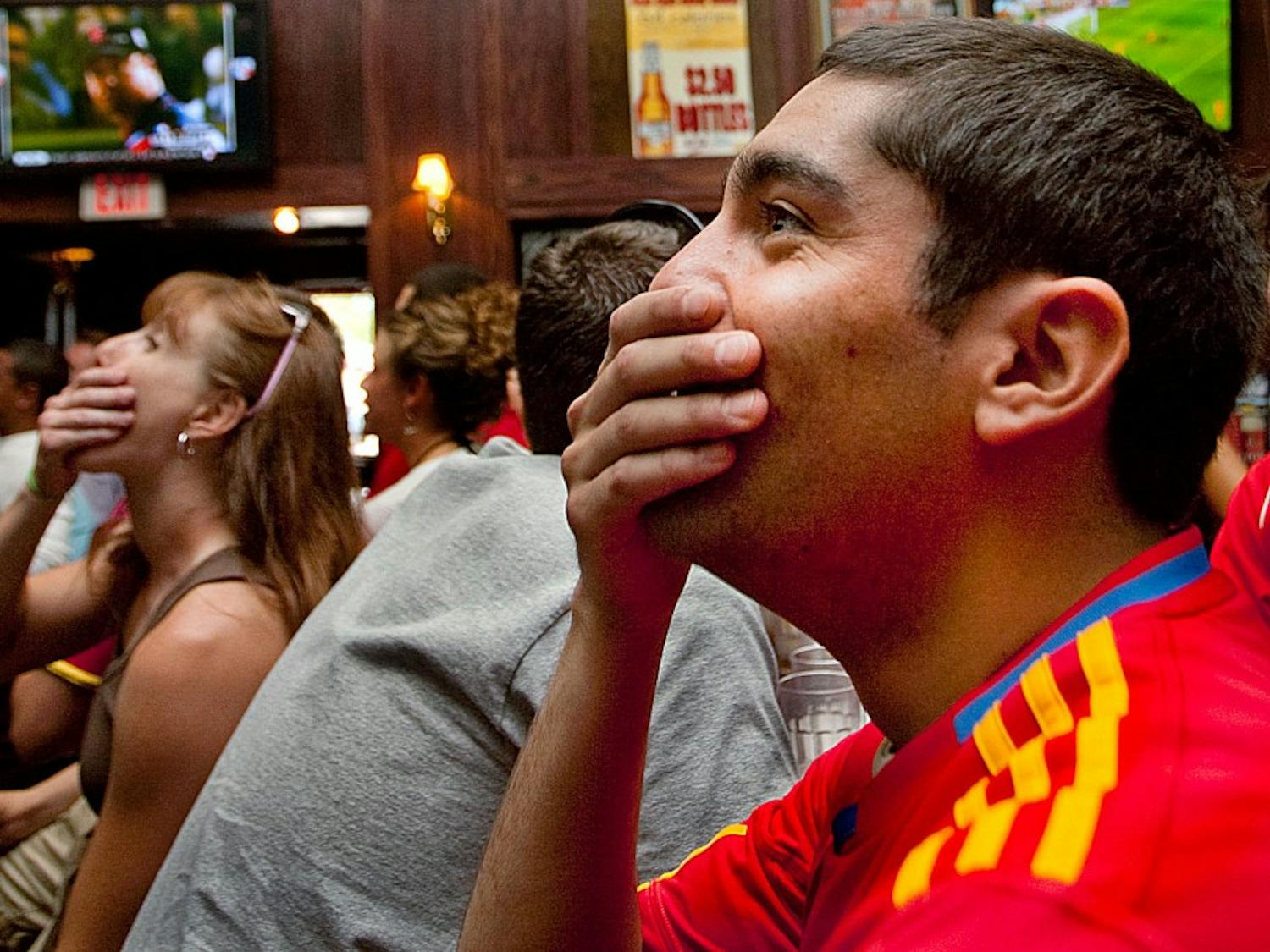 	Guillermo Trujillo anxiously watches the 2010 FIFA World Cup final between Spain and the Netherlands at Fox and Hound Pub and Grille on July 11. The Spaniards were victorious over the Dutch in extra time, 1-0.
