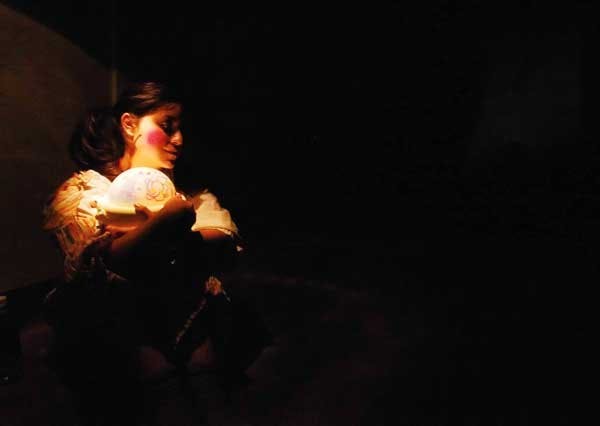 Renee Delgado acts as a 5-year-old girl who haunts the basement of Mesa Vista Hall. El Centro de la Raza is hosting the haunted house today from noon to 4 p.m. 