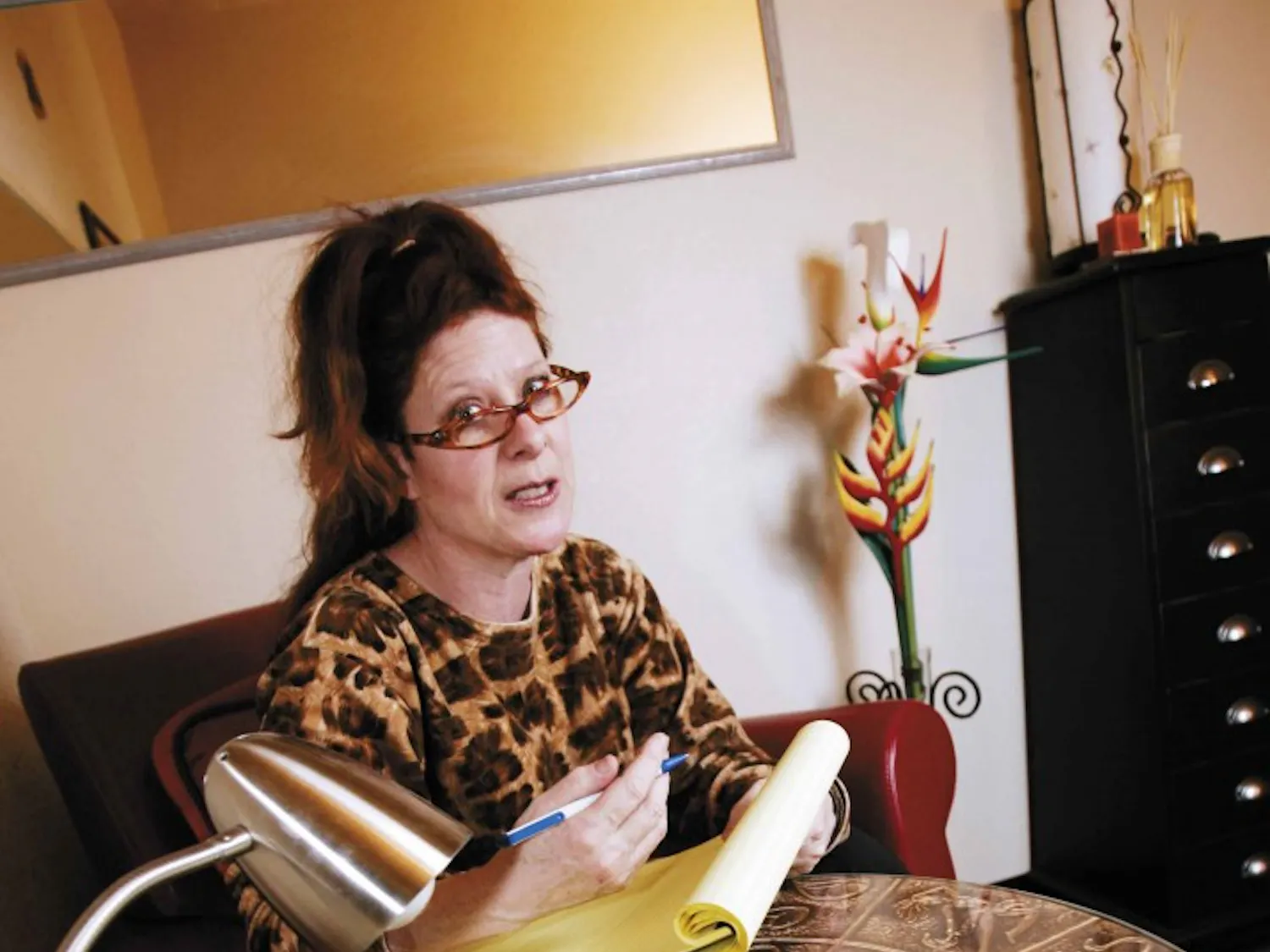 Clinical hypnotherapist Christina Florence sits in her office on San Pedro Boulevard on Tuesday. Florence said she can help relieve test anxiety, aid sour relationships and free writer's block.