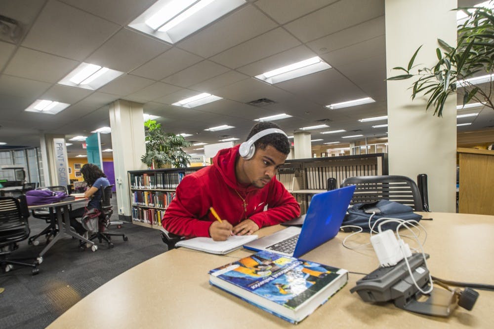 Junior business administration major Jason Dalcour studies at Zimmerman Library on Sunday, Jan. 22, 2017.