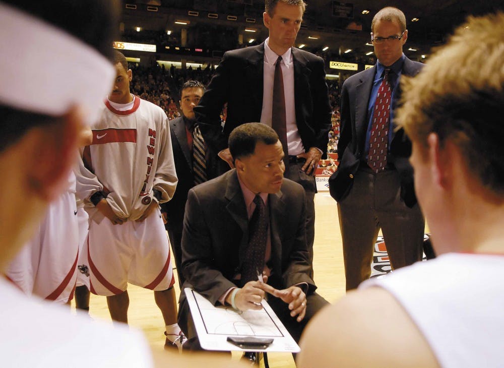 Head coach Ritchie McKay talks to his team during the second half of Wednesday's 70-49 loss to Brigham Young at The Pit. 