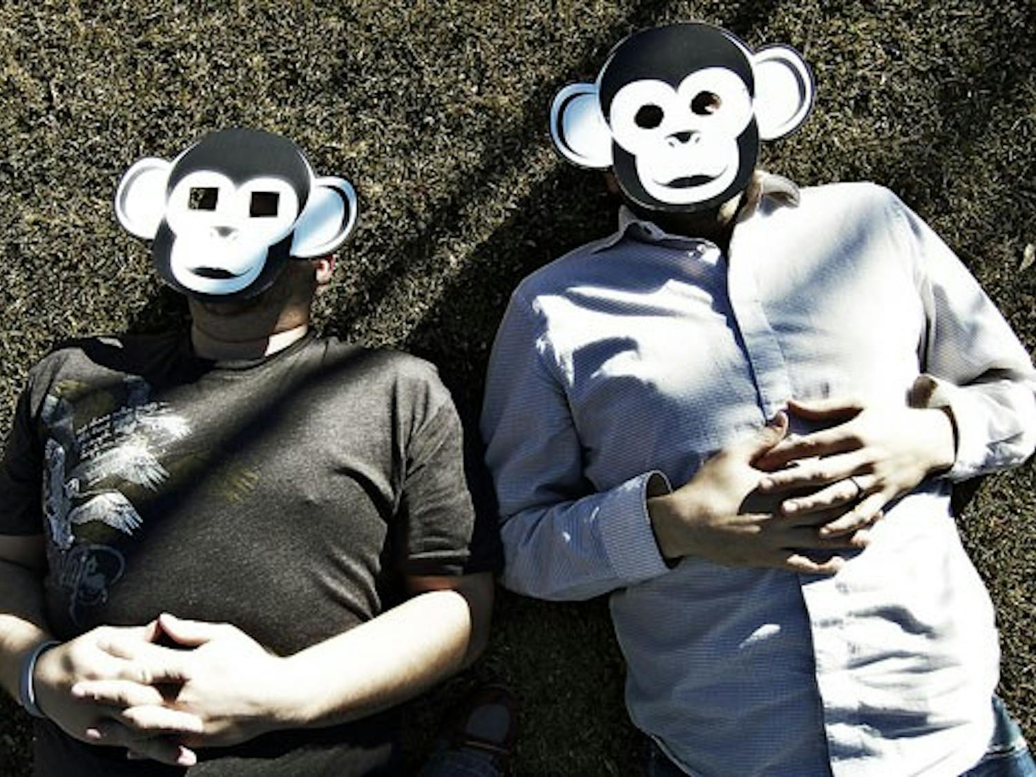 Members of the "Are You a Monkey?" group have left chalk drawings around UNM and launched a cryptic Web site in support of creationism.