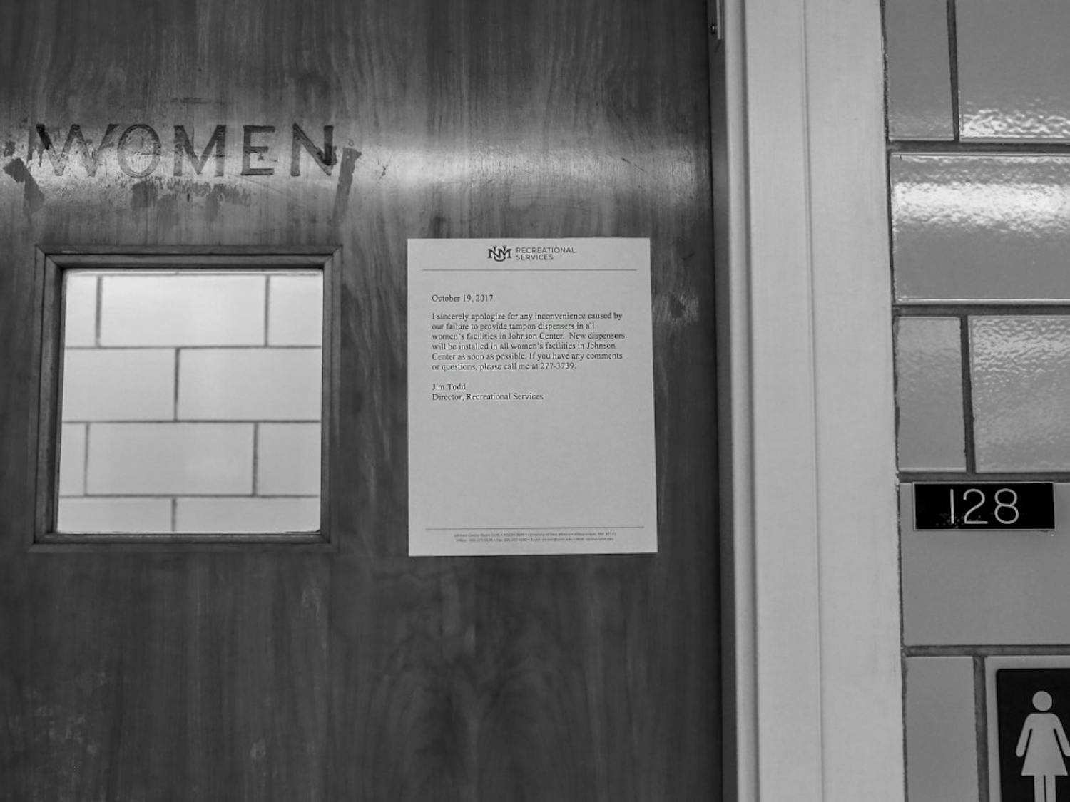A sign apologizing for the lack of tampon dispensers is displayed outside a women?s restroom at Johnson Gym on Oct. 20, 2017. 

