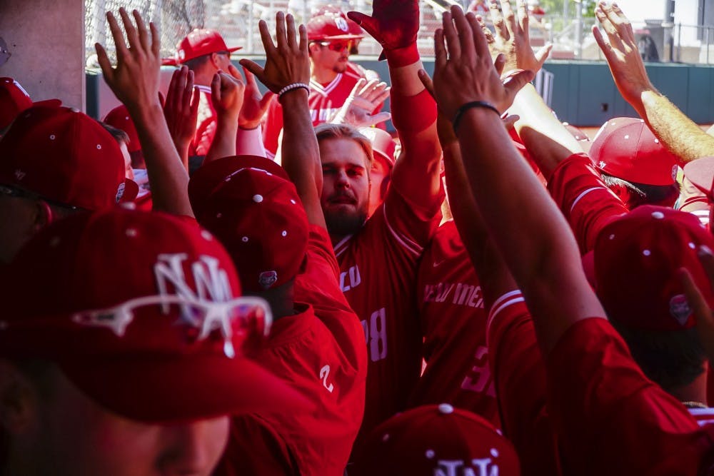 Jack Zoellner congradulated by the dugout after hitting a 3-run homerun against UNLV on Saturday 4/21.