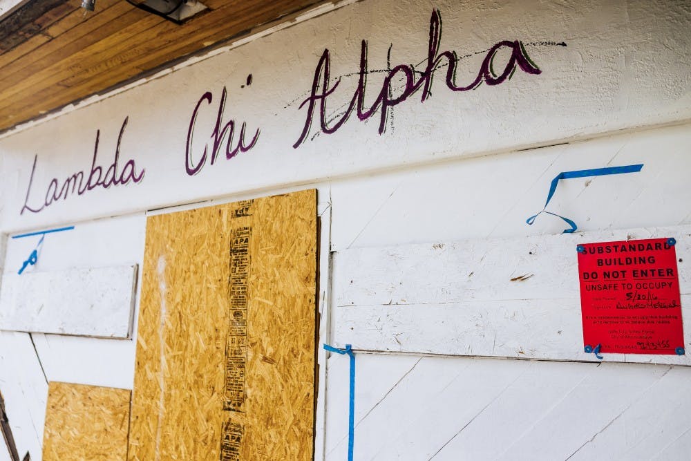 A abandoned Lambda Chi Alpha house rests on the north side of UNM main campus. Greek life representatives had said that despite the number or abandoned fraternity and sorority houses, that membership is on the rise.