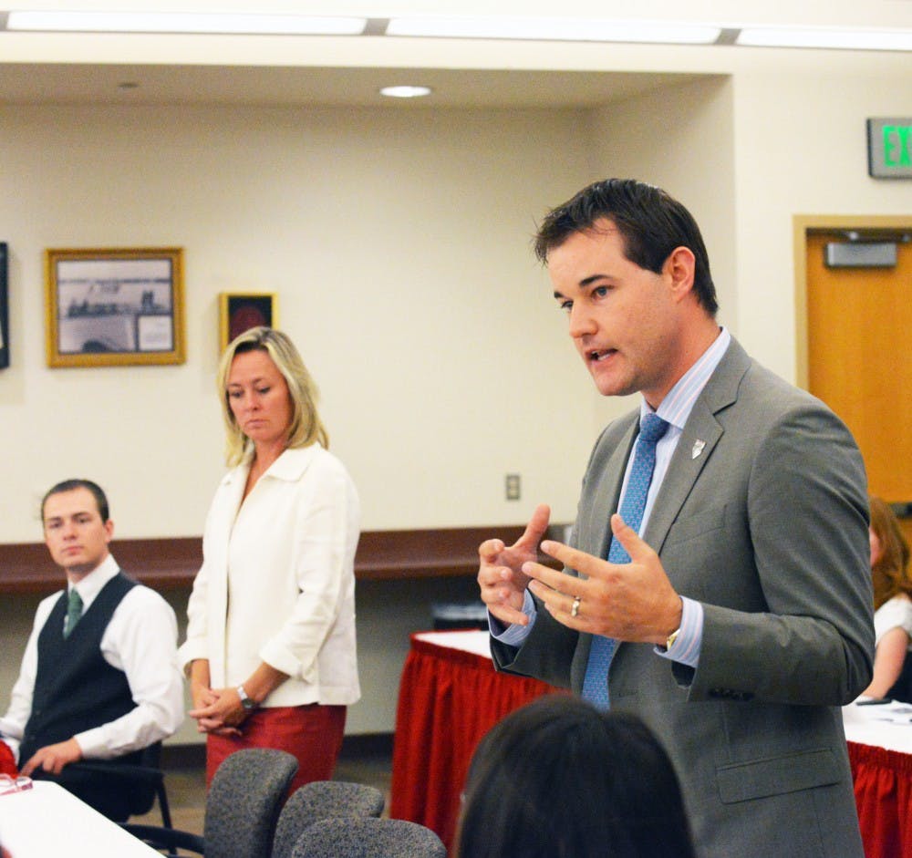 Kevin Stevenson, strategic planner in the Office of the President, presents UNM's construction  projects to ASUNM on Wednesday evening.