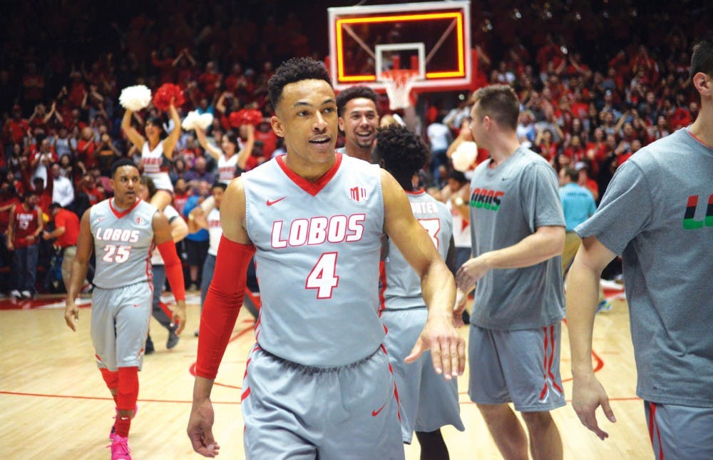 The Lobos storm the court to celebrate after their victory against Boise State for the second place position in the Mountain West Conference Wednesday night at WisePies Arena. The Lobos beat Boise State 80-78.