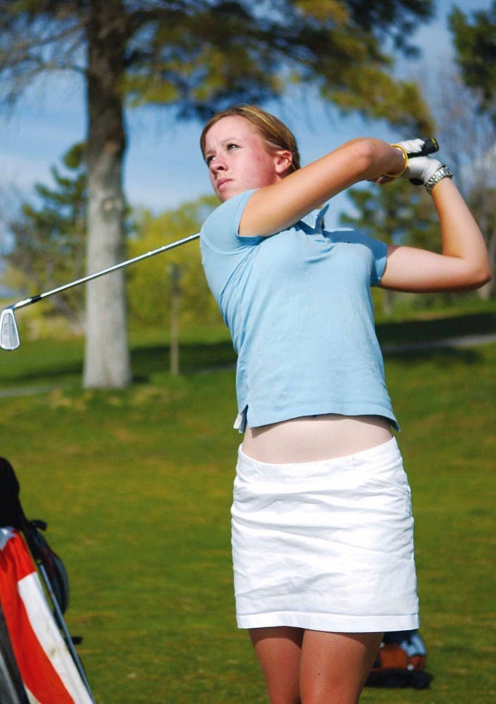 Jodi Ewart swings during practice at the UNM Championship Golf Course on April 5. Ewart was named Mountain West Conference Freshman Player of the Year and Co-player of the Year after winning the MWC Women's Golf Championship on April 21.  