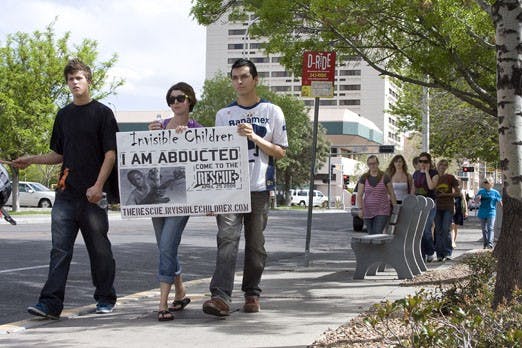 Students march from Civic Plaza to Tiguex Park during a rally for the Invisible Children organization on Saturday. The rally was scheduled to end Sunday, but protesters will meet again in front of City Hall today in hopes of getting attention from politic