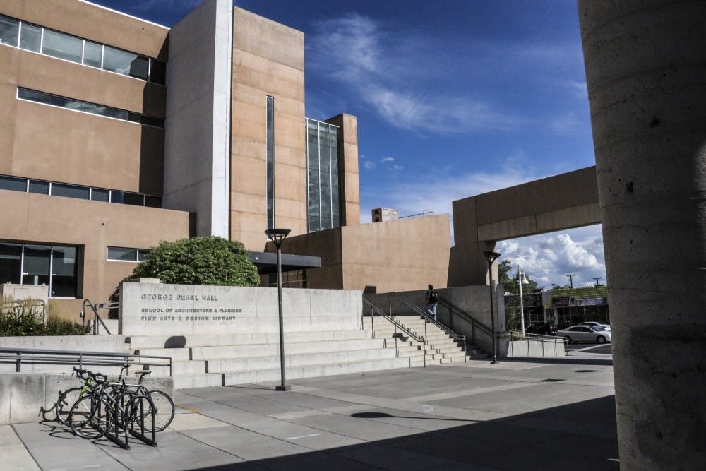 A student walks into George Pearl Hall on the afternoon of Aug. 26, 2018.